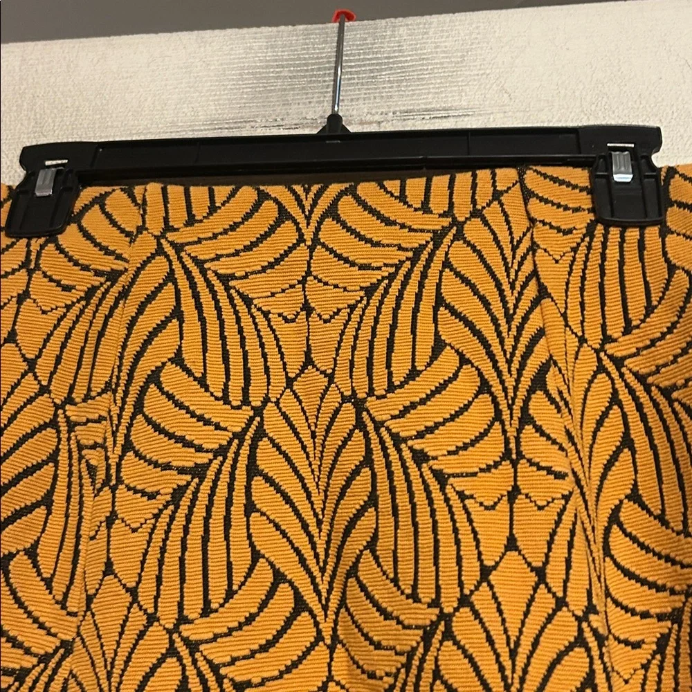 Stradivarius A-Line Mini Skirt Size Medium In Orange with Black Leaf Pattern